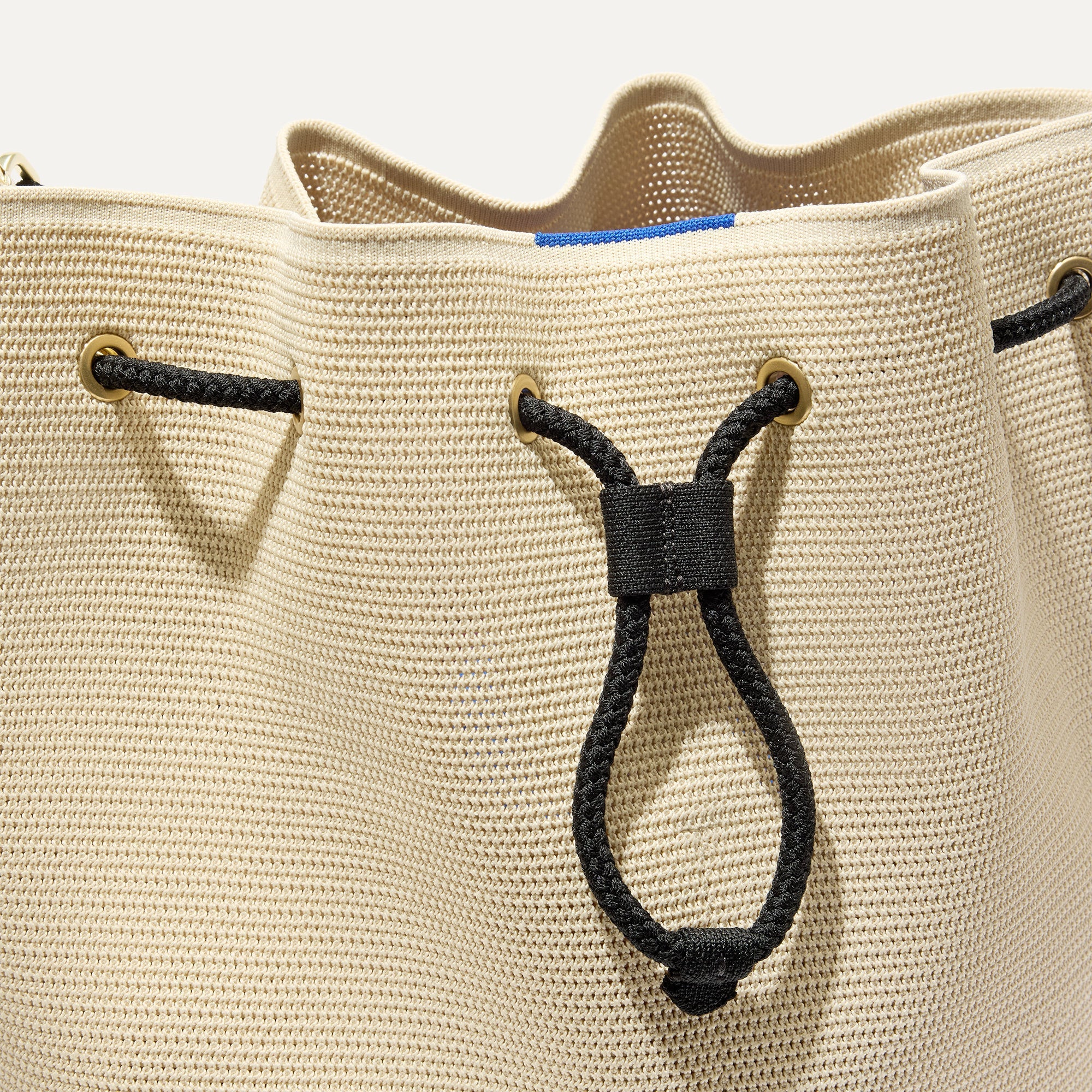 The Cinch Bucket Bag - Black and White Raffia-Knit